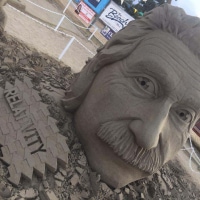 Couldn't resist gifting a BLESSED EARTH CRYSTAL to Einstein, at the Parksville Sandcastle comp on Vancouver Island, Bc